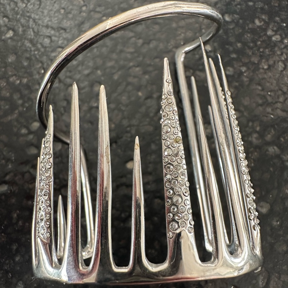 Gorgeous Alexis Bittar bangle that is silver w glittery little stones.
